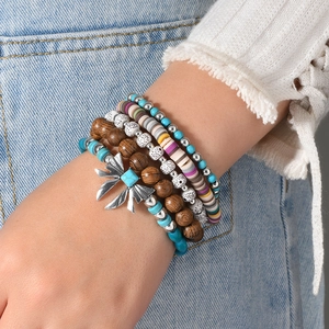 Bohemian multi-layer stretch bracelet with turquoise beads and silver feather pendant