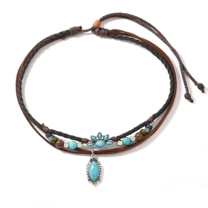 Bohemian multilayer necklace with turquoise, brown woven rope and vintage metal beads