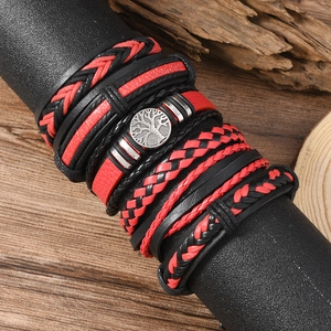 Men's 6-piece tree of life leather wrap bracelet set with silver charms on wood