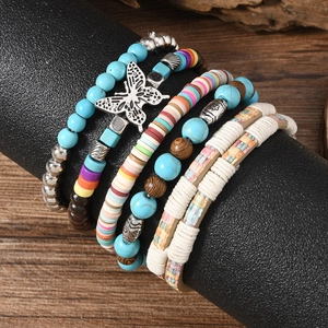 Bohemian multilayer beaded bracelet with turquoise stones and butterfly charm