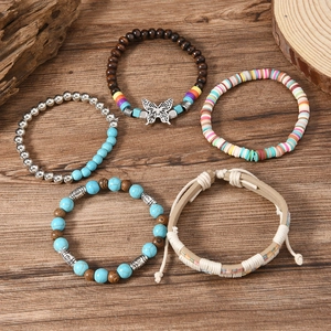 Five-piece Bohemian beaded bracelet set with wooden beads and butterfly charm