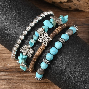 Bohemian four-piece elastic bracelet set with turquoise beads and silver butterfly charm