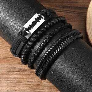 4-piece men's black woven leather bracelet set featuring a silver razor blade charm