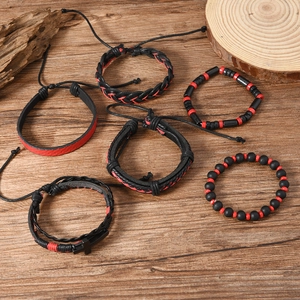 6-piece men's leather bracelet set with cross charm and beads on rustic wooden surface