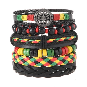6-piece bohemian leather bracelet set with Rasta colors and vintage sun disk charms