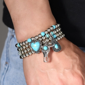 Bracelet multicouche bohème en turquoise avec breloques tête de taureau et cœur