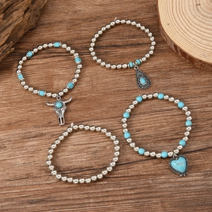 Ensemble de bracelets bohèmes en argent et turquoise avec pendentifs cœur et taureau