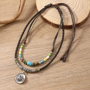 Bohemian double-layer woven necklace with colorful beads and Mexican hat metal pendant