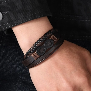 Men's multilayer braided leather bracelet featuring a black infinity symbol and magnetic clasp