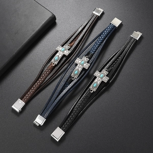 Three multi-layer braided leather bracelets with turquoise cross charms and metal clasps