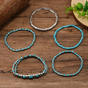 5-piece Bohemian turquoise bead bracelet set with vintage silver flower bangle