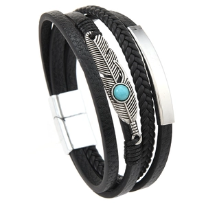 Multilayer leather bracelet with silver feather and turquoise bead on white background
