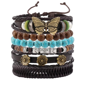 Bohemian multilayer bracelet set featuring turquoise beads, wood charms and butterfly pendant