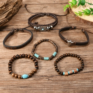 Vintage boho set with leather braid, bull head pendant, wood beads, and turquoise stones