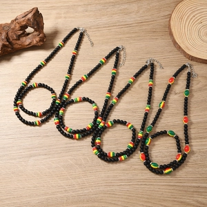 Set of four reggae style bohemian beaded necklaces with red yellow green accents
