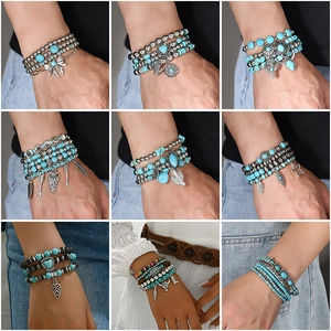 Bohemian style multi-layer turquoise bead bracelet set with unique metal charms