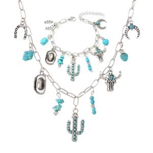 Bohemian silver necklace and bracelet set with cactus, lucky horseshoe, and turquoise