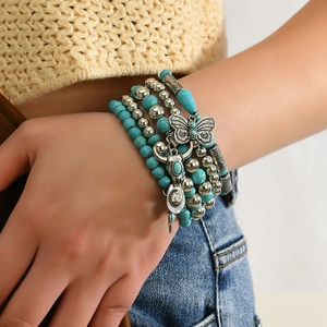Bohemian multilayer turquoise and silver bead bracelet set with butterfly and bull charms