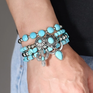 Bohemian multilayer turquoise and wood bead bracelet set with cactus and sun metal pendants