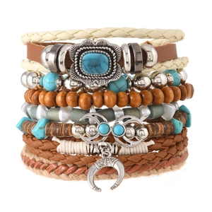 Detail of bohemian turquoise beaded bracelet set with woven cords and crescent moon charm