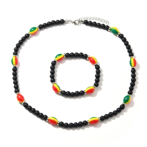 Detail of bohemian colorful beaded necklace set with silver lobster clasp and extension chain