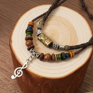 Ethnic style double-layer woven necklace with wood beads and silver musical note pendant