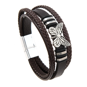 Multilayer leather bracelet featuring a silver butterfly charm and magnetic buckle