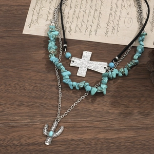 Boheems gelaagde ketting met turquoise kralen, zilveren kruis en cactus hangers