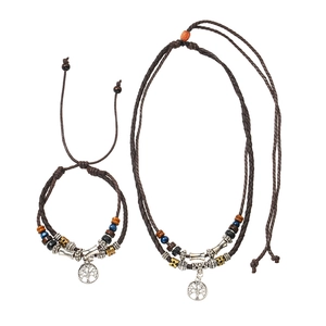 Detail of woven multi-layer necklace with tree of life pendant and colorful beads