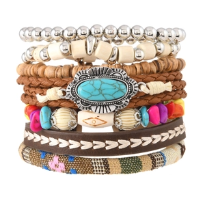 Detail of bohemian layered bracelet set with turquoise stones and ethnic wood beads