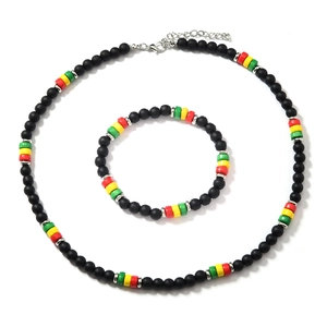 Detail of bohemian necklace and bracelet set with colorful beads and lobster clasp