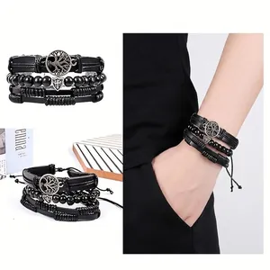Set bracciali multistrato in ecopelle nera con ciondoli albero della vita e scudo