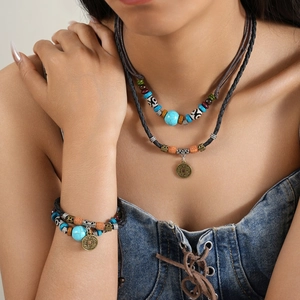 Ethnic bohemian layered necklace and bracelet set with turquoise beads and woven ropes