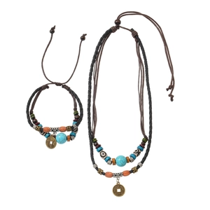 Ethnic wolf fang double necklace with vintage turquoise beads and copper coins