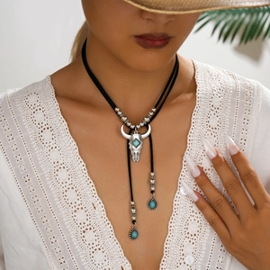 Bohemian bull skull pendant necklace with turquoise beads and black velvet cord