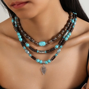 Ensemble de colliers triple rang vintage avec perles turquoise et pendentif coeur