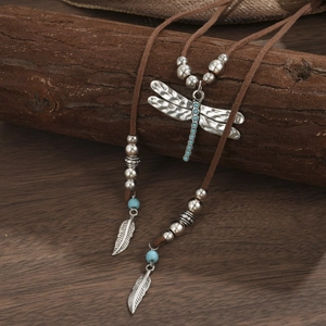Bohemian silver dragonfly pendant necklace with turquoise beads and feather details