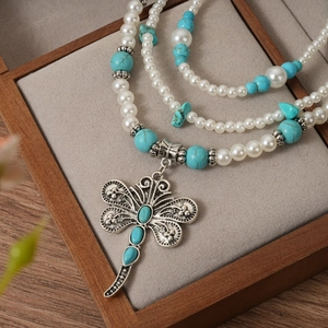 Bohemian multi-layer necklace with dragonfly pendant, turquoise beads and pearls