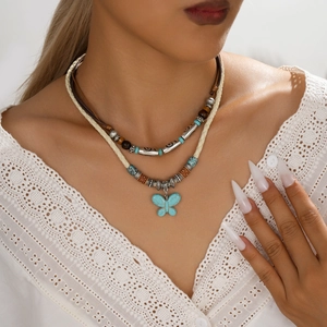 Ethnic butterfly pendant layered necklace with turquoise beads and retro vintage cords