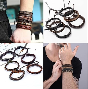 Detail of multi-layer braided leather bracelets with wooden beads and ethnic cords