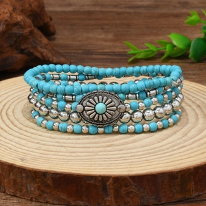 Five-piece bohemian turquoise beaded bracelet set with vintage floral metal charms