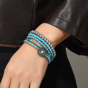 5-layer bohemian blue turquoise beaded bracelet set with vintage floral silver charm on wrist