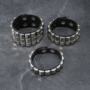 Set of 3 punk geometric rivet leather bracelets with silver metal studs on black bands