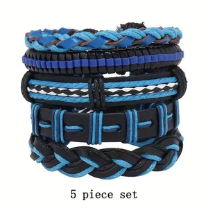 Macro detail of 5-piece handmade braided bracelets featuring blue and black nautical cords