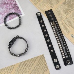 4-piece men punk jewelry set with studded leather bracelets and black bead wristbands