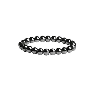 Detail shot of hematite beaded bracelet with metallic luster and polished dark grey spheres