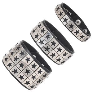 Punk black leather bracelet set with star rivets and adjustable metallic snap buttons