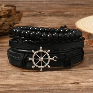 Men's multilayer black beaded and leather bracelet set with silver rudder anchor charms