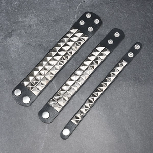 Three-piece punk black leather bracelet set with square silver studs and metal snaps