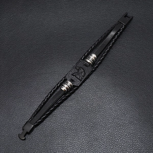 Multi-layer woven leather men's bracelet with eagle eagle charm and metal clasp